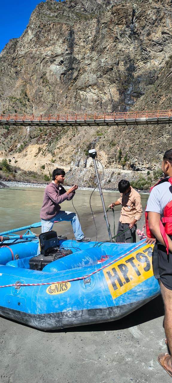GNSS and echo sounder mounted on an inflatable raft for river bathymetry